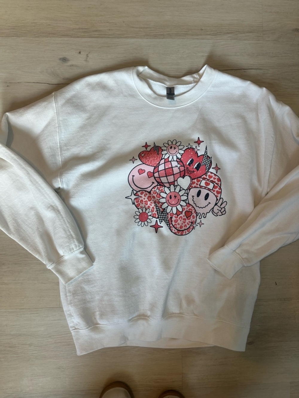 Gildan White Crewneck Sweatshirt with Pink Cartoon Floral Graphic